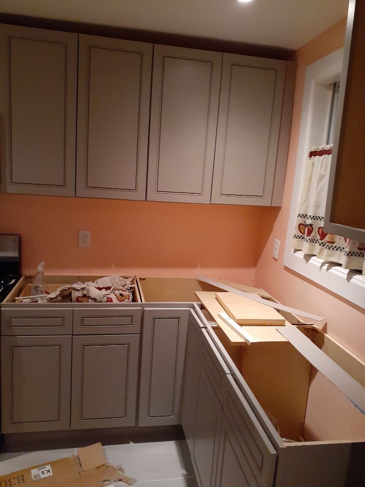Kitchen cabinet installation in progress on a Pikesville MD remodel